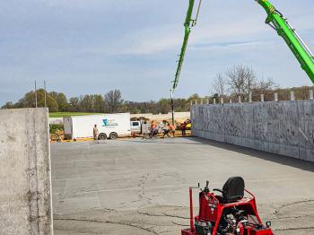 ride-on trowel ready to start troweling concrete slab